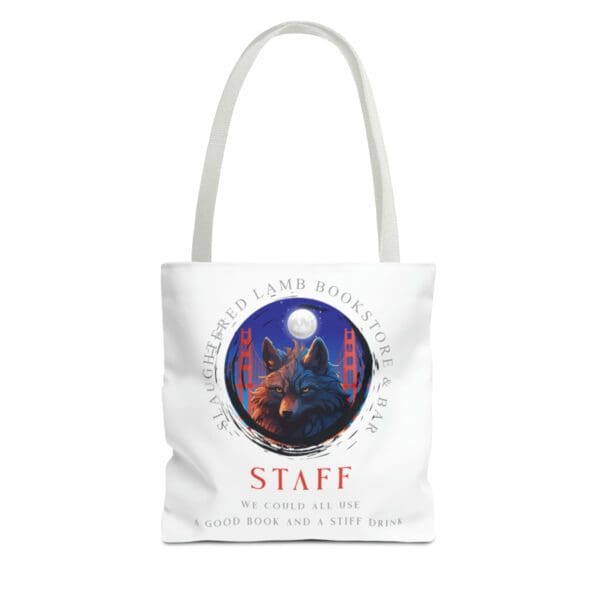 A white tote bag with an image of a cat and moon.