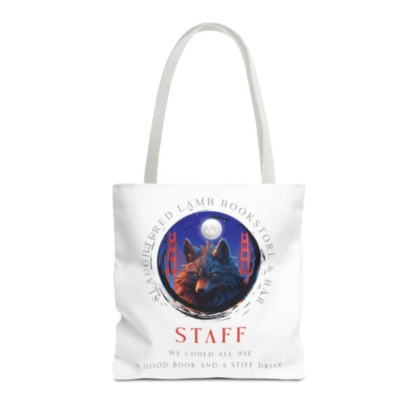 A white tote bag with an image of a wolf and the words staff.