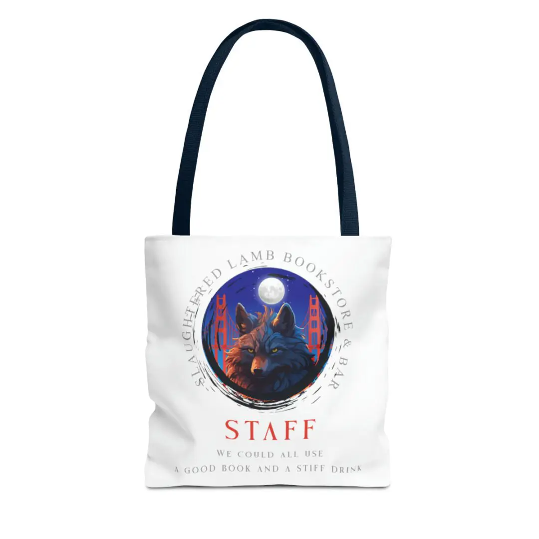 A white tote bag with a picture of a cat and moon.