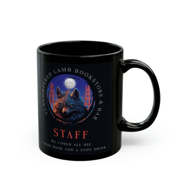 A black mug with the words " staff " on it.