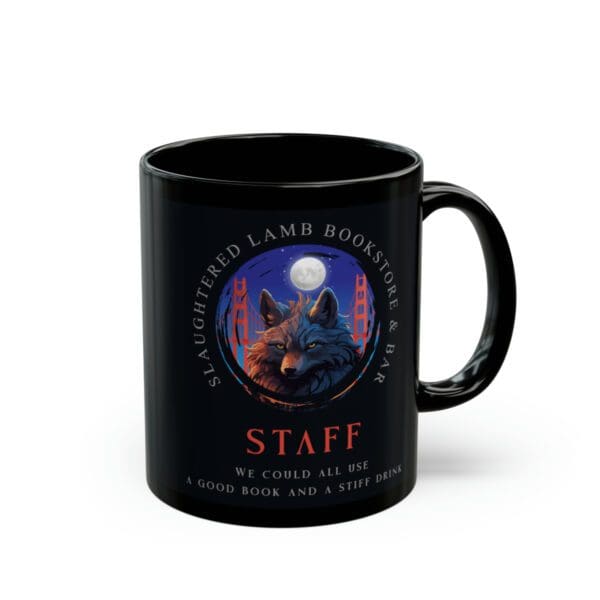 A black mug with a picture of a wolf and the words " staff ".